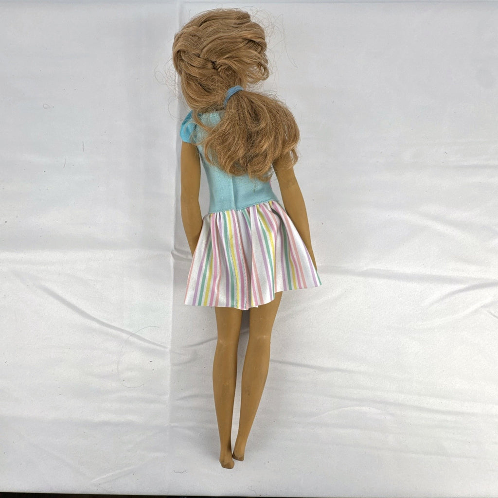 Mattel My First Barbie Teresa 14.5-inch preschool doll wearing a pastel striped ruffle dress
