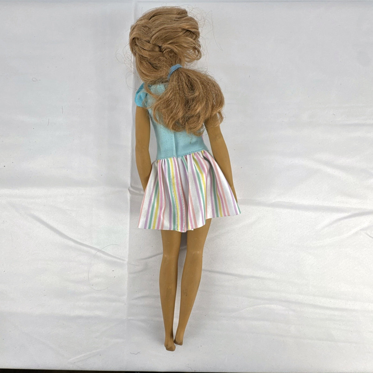 Mattel My First Barbie Teresa 14.5-inch preschool doll wearing a pastel striped ruffle dress