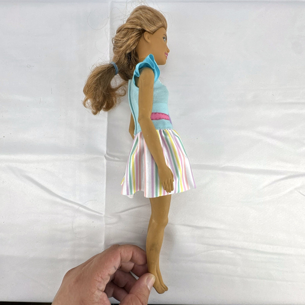 Mattel My First Barbie Teresa 14.5-inch preschool doll wearing a pastel striped ruffle dress