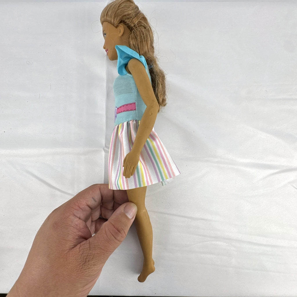 Mattel My First Barbie Teresa 14.5-inch preschool doll wearing a pastel striped ruffle dress
