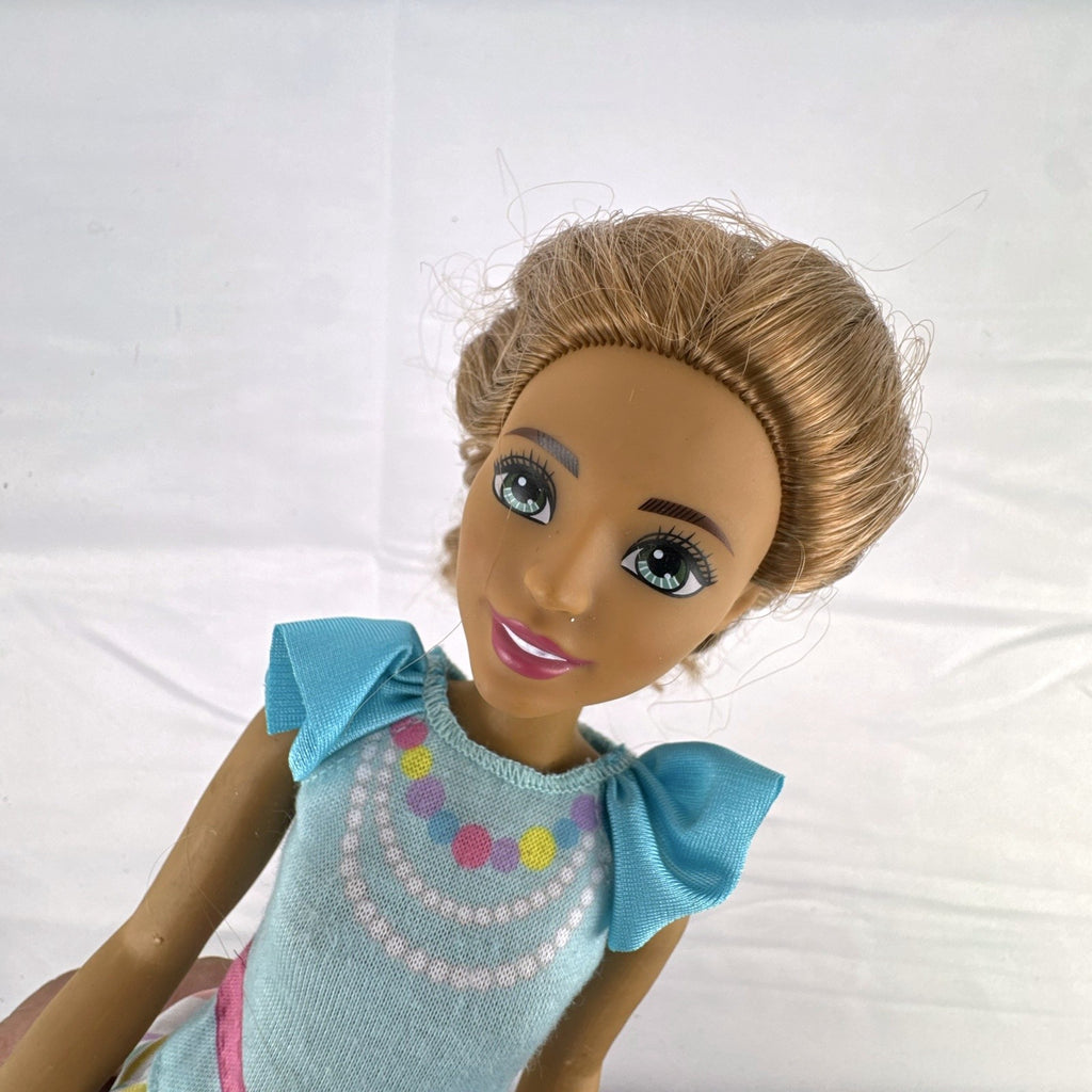 Mattel My First Barbie Teresa 14.5-inch preschool doll wearing a pastel striped ruffle dress