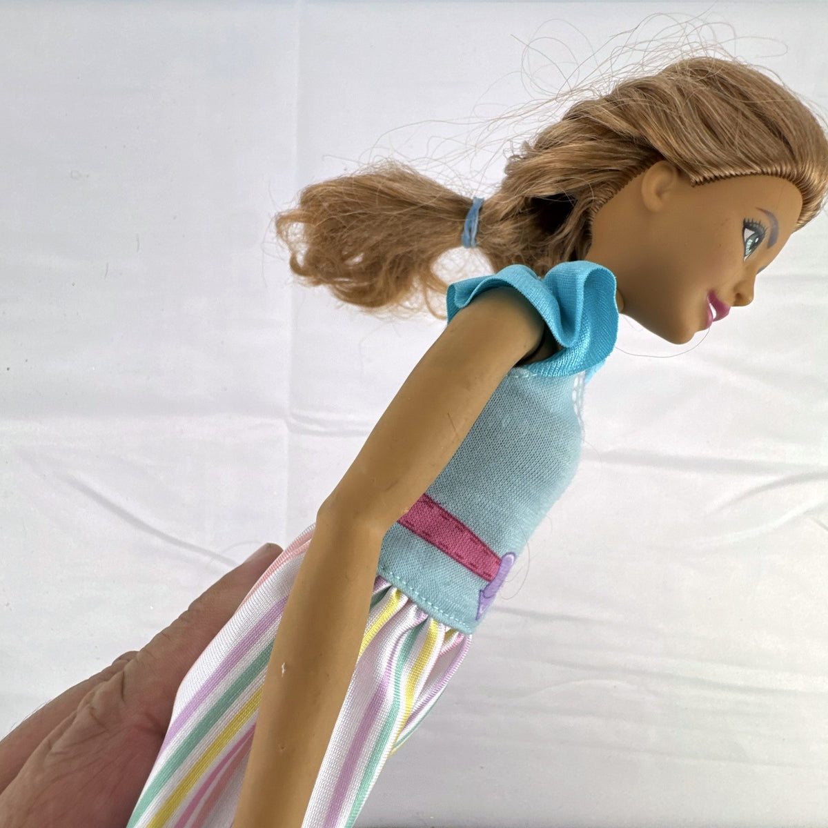 Mattel My First Barbie Teresa 14.5-inch preschool doll wearing a pastel striped ruffle dress