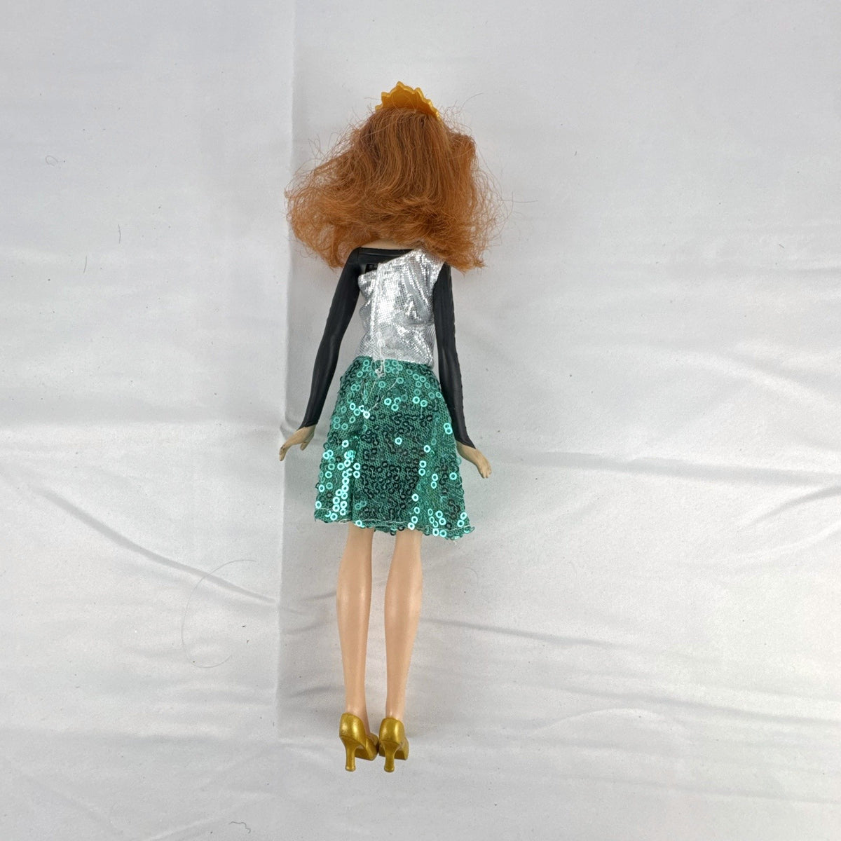 Hasbro Disney Frozen Style Series 11-inch Anna doll wearing a sequin dress and gold heels