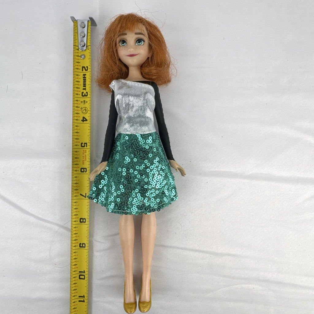 Hasbro Disney Frozen Style Series 11-inch Anna doll wearing a sequin dress and gold heels