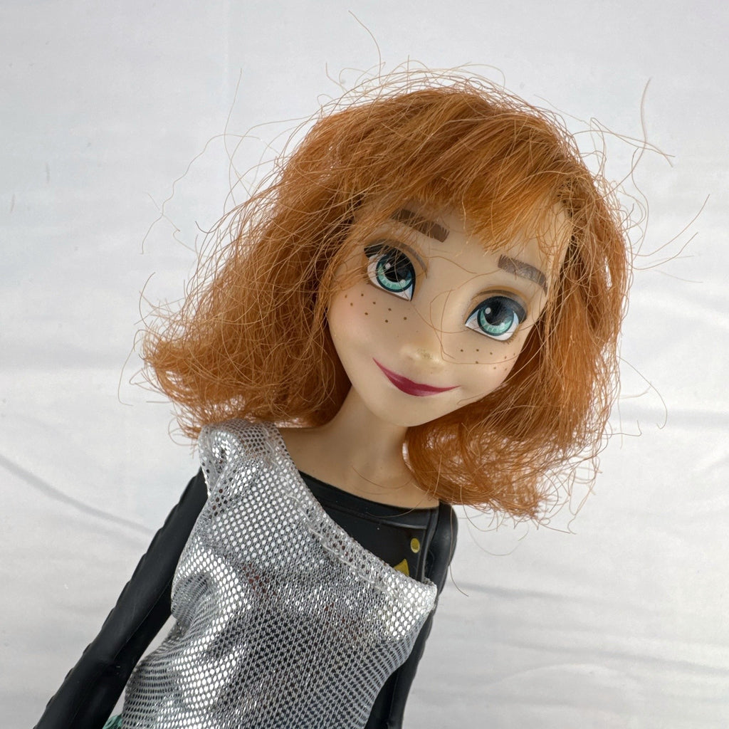 Hasbro Disney Frozen Style Series 11-inch Anna doll wearing a sequin dress and gold heels