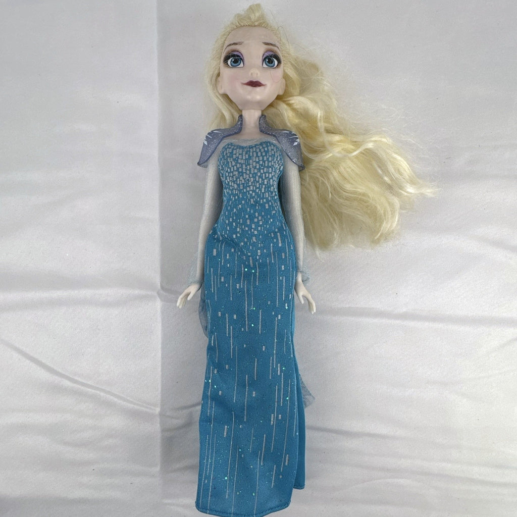 Disney Store Frozen Elsa classic fashion doll wearing sparkling blue gown with sheer cape