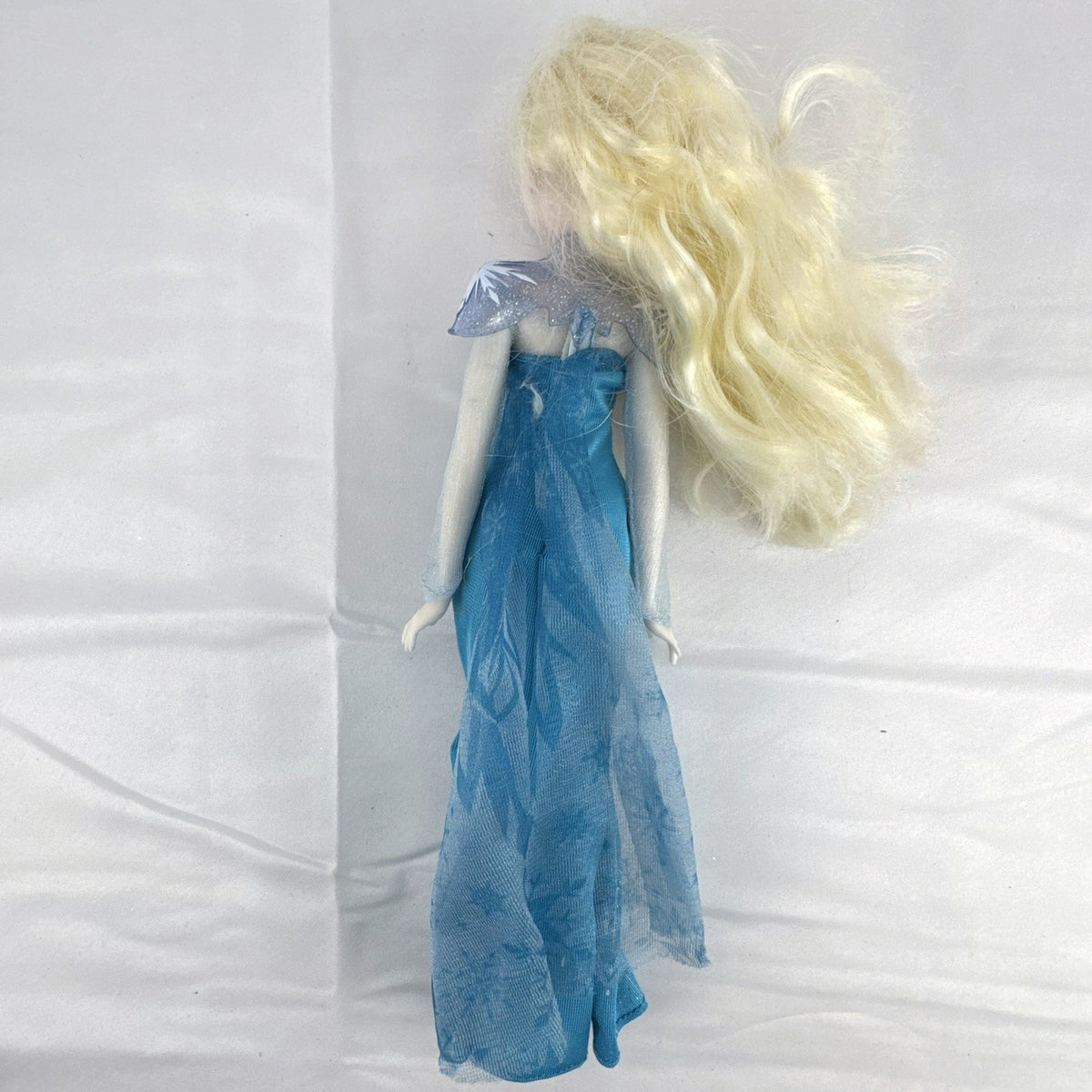 Disney Store Frozen Elsa classic fashion doll wearing sparkling blue gown with sheer cape