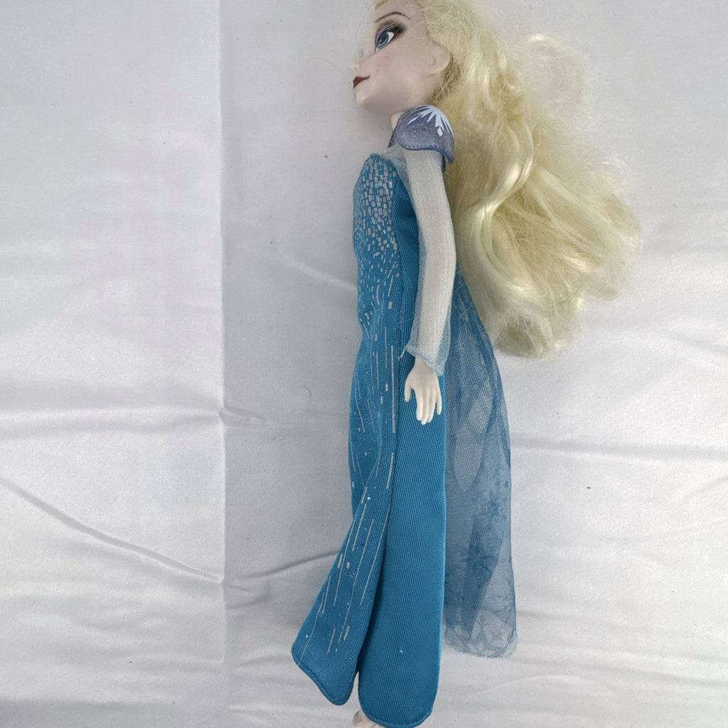 Disney Store Frozen Elsa classic fashion doll wearing sparkling blue gown with sheer cape