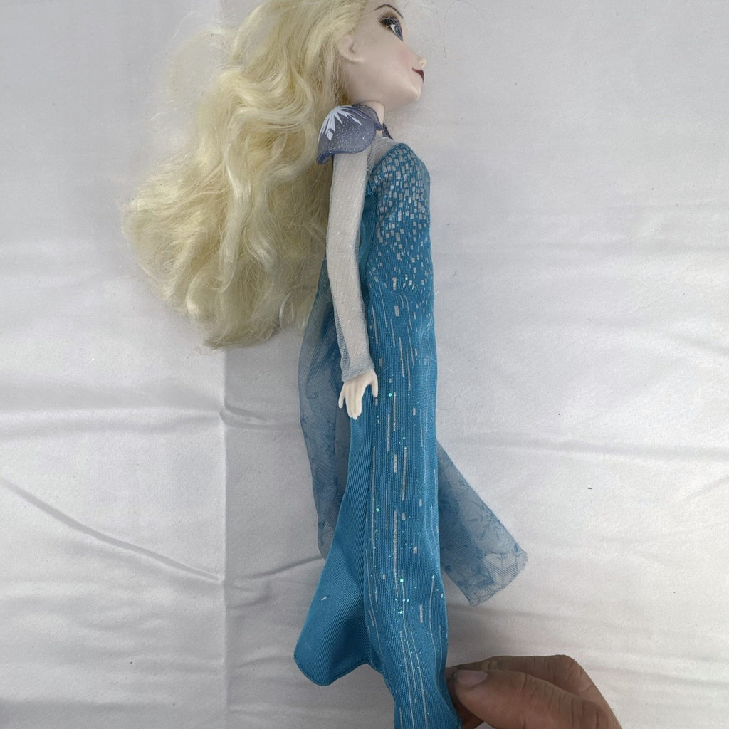 Disney Store Frozen Elsa classic fashion doll wearing sparkling blue gown with sheer cape