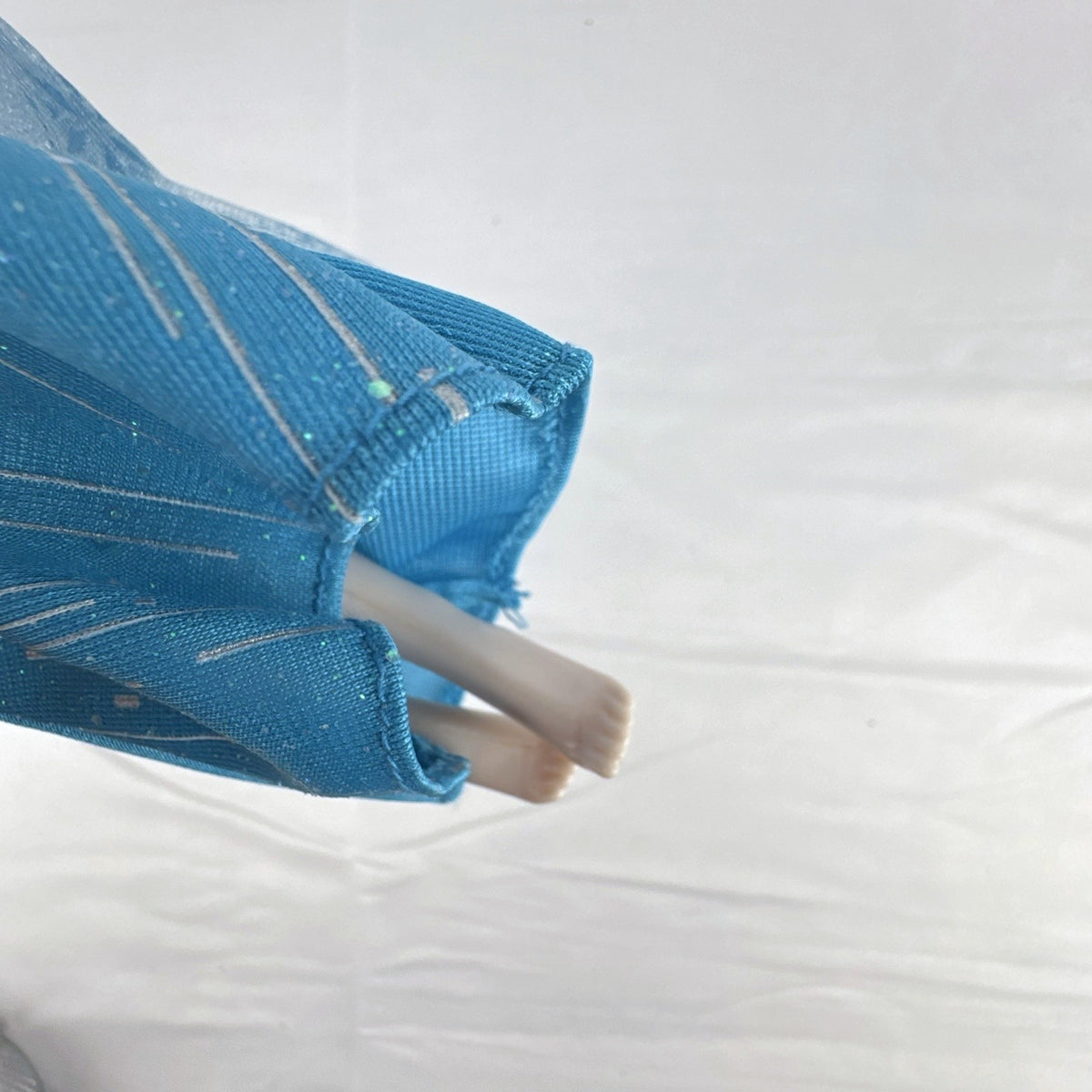 Disney Store Frozen Elsa classic fashion doll wearing sparkling blue gown with sheer cape