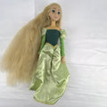 Disney Princess Rapunzel 12-inch fashion doll wearing a two-tone green gown with gold trim and grey shoes.