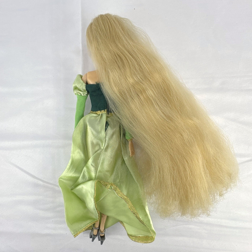 Disney Princess Rapunzel 12-inch fashion doll wearing a two-tone green gown with gold trim and grey shoes.