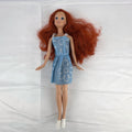 Disney Princess Ariel 11-inch fashion doll with red hair in a blue floral dress and white sneakers