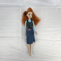 Mattel Disney Frozen 11-inch Princess Anna doll with red hair, molded bodice, and denim skirt.