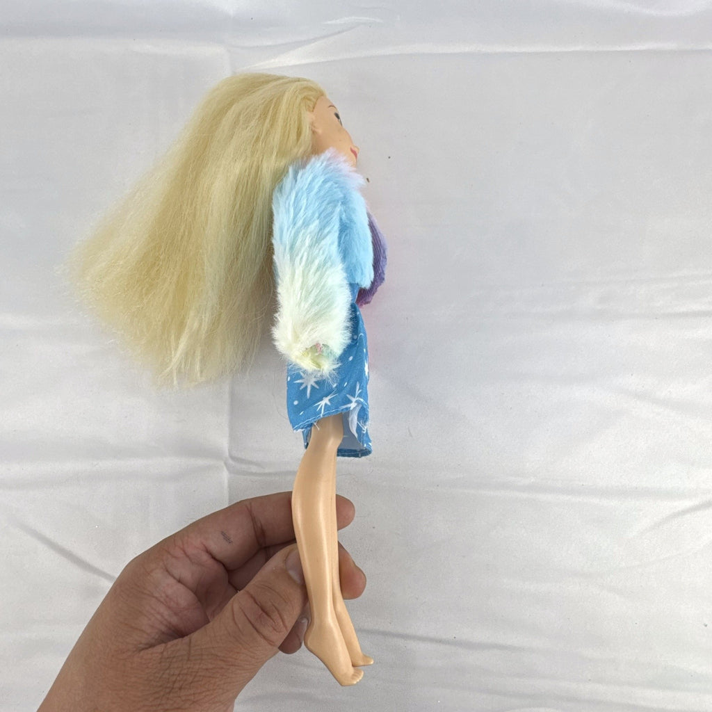 Disney Tangled Rapunzel 11-inch fashion doll wearing blue star dress and pastel faux fur jacket