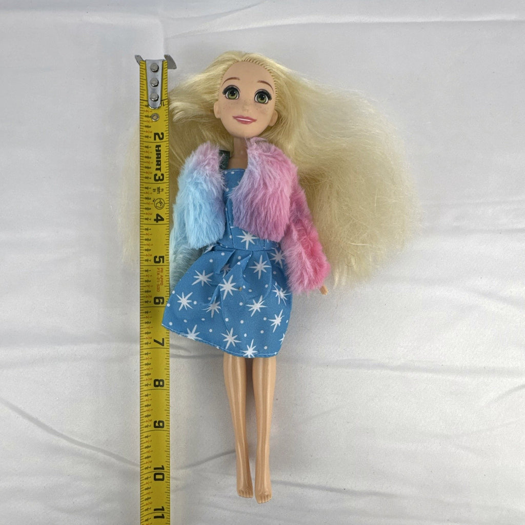 Disney Tangled Rapunzel 11-inch fashion doll wearing blue star dress and pastel faux fur jacket