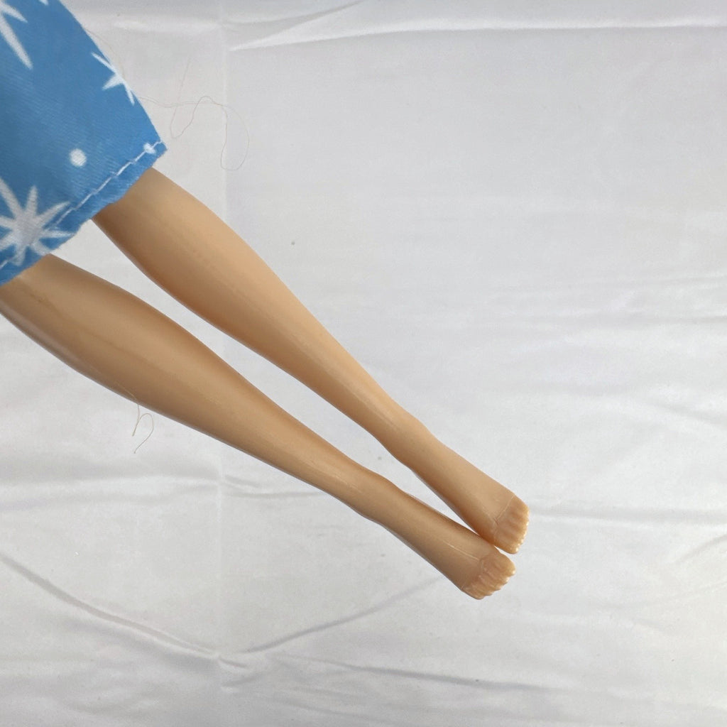 Disney Tangled Rapunzel 11-inch fashion doll wearing blue star dress and pastel faux fur jacket
