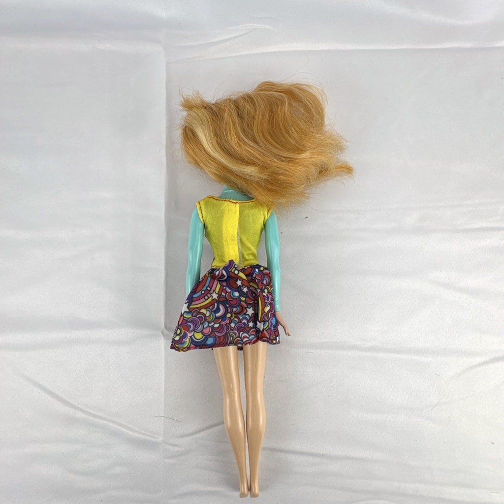 Mattel 11.5-inch Disney Frozen Princess Anna fashion doll wearing patterned dress with strawberry-blonde hair