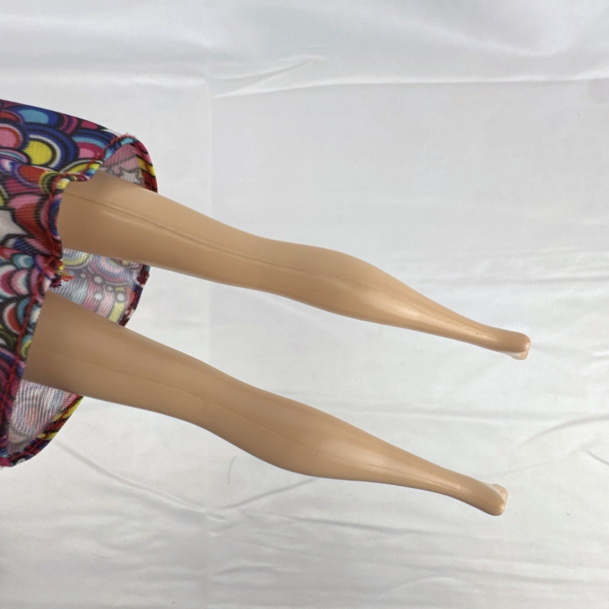 Mattel 11.5-inch Disney Frozen Princess Anna fashion doll wearing patterned dress with strawberry-blonde hair