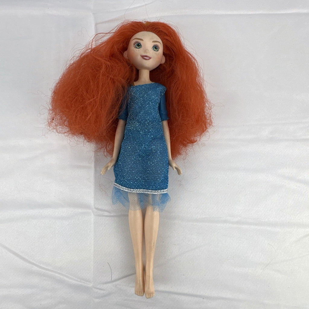 Mattel Disney Pixar Brave Merida 11-inch fashion doll with curly red hair and blue glitter dress
