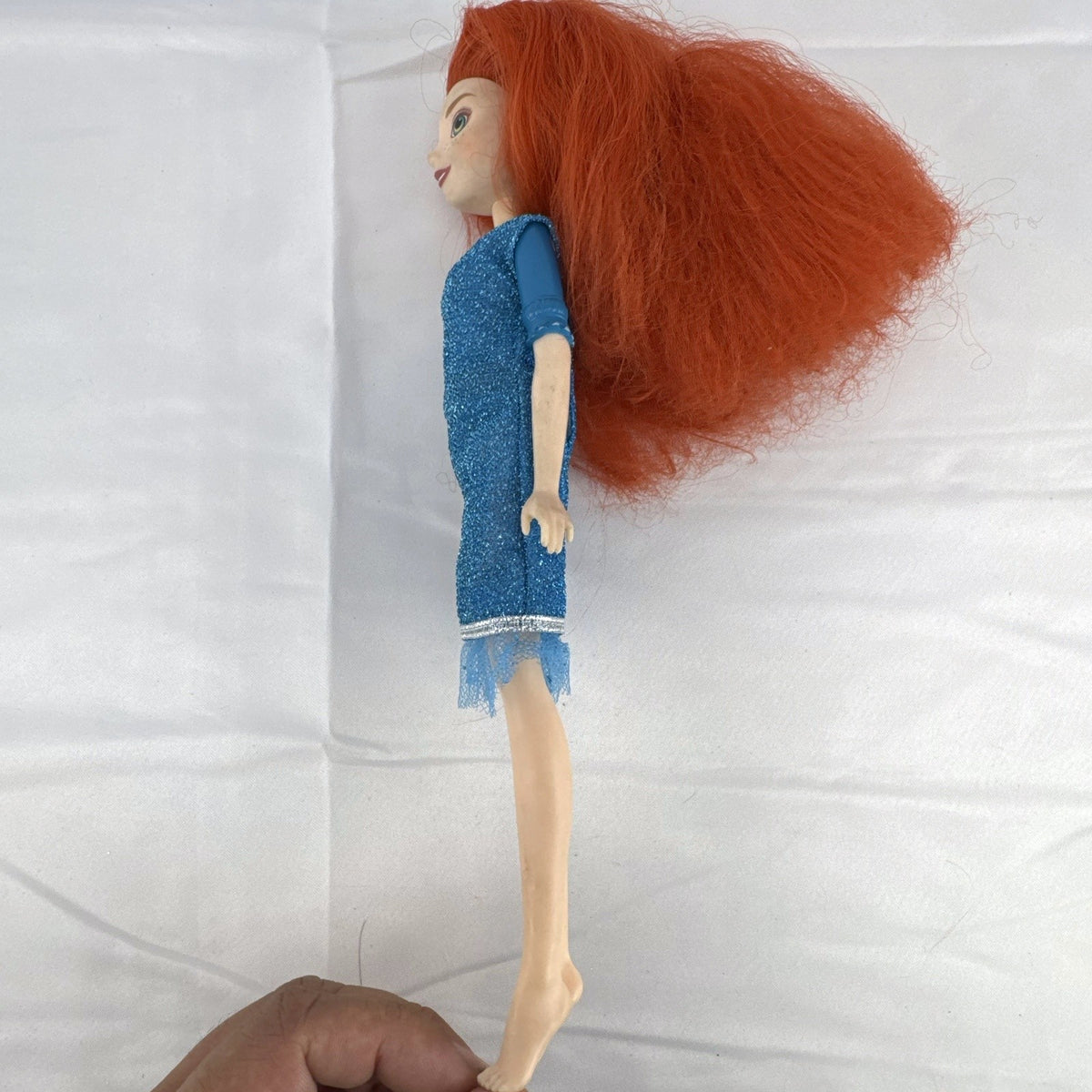 Mattel Disney Pixar Brave Merida 11-inch fashion doll with curly red hair and blue glitter dress