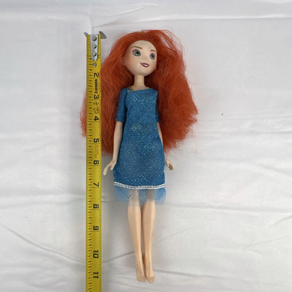 Mattel Disney Pixar Brave Merida 11-inch fashion doll with curly red hair and blue glitter dress