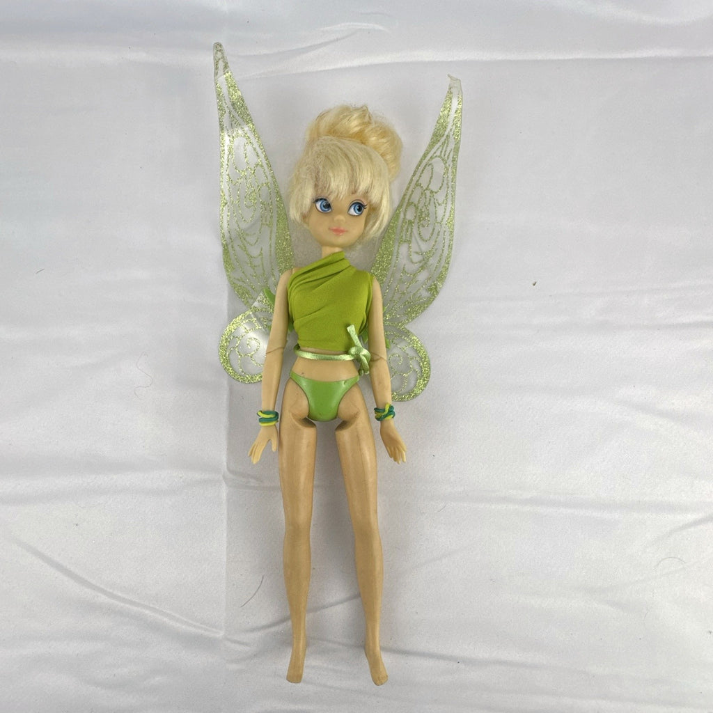 Disney Fairies Tinker Bell 9-inch articulated fashion doll with translucent glitter wings.