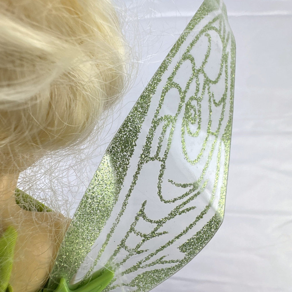 Disney Fairies Tinker Bell 9-inch articulated fashion doll with translucent glitter wings.