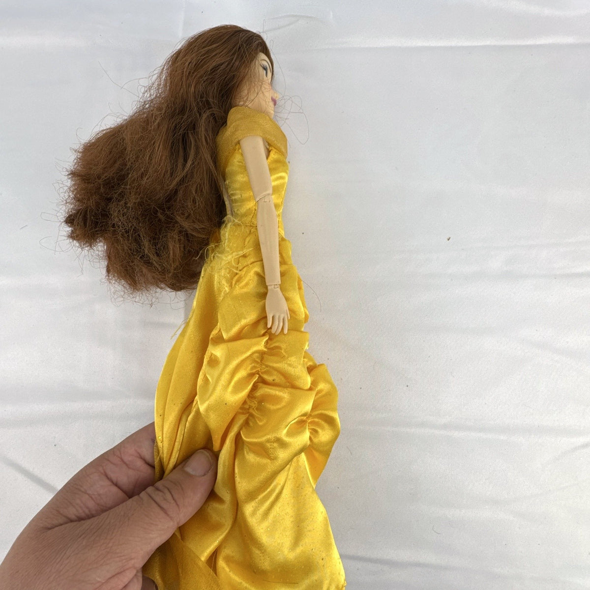 Disney Belle 11.5 inch articulated fashion doll wearing yellow ballroom gown