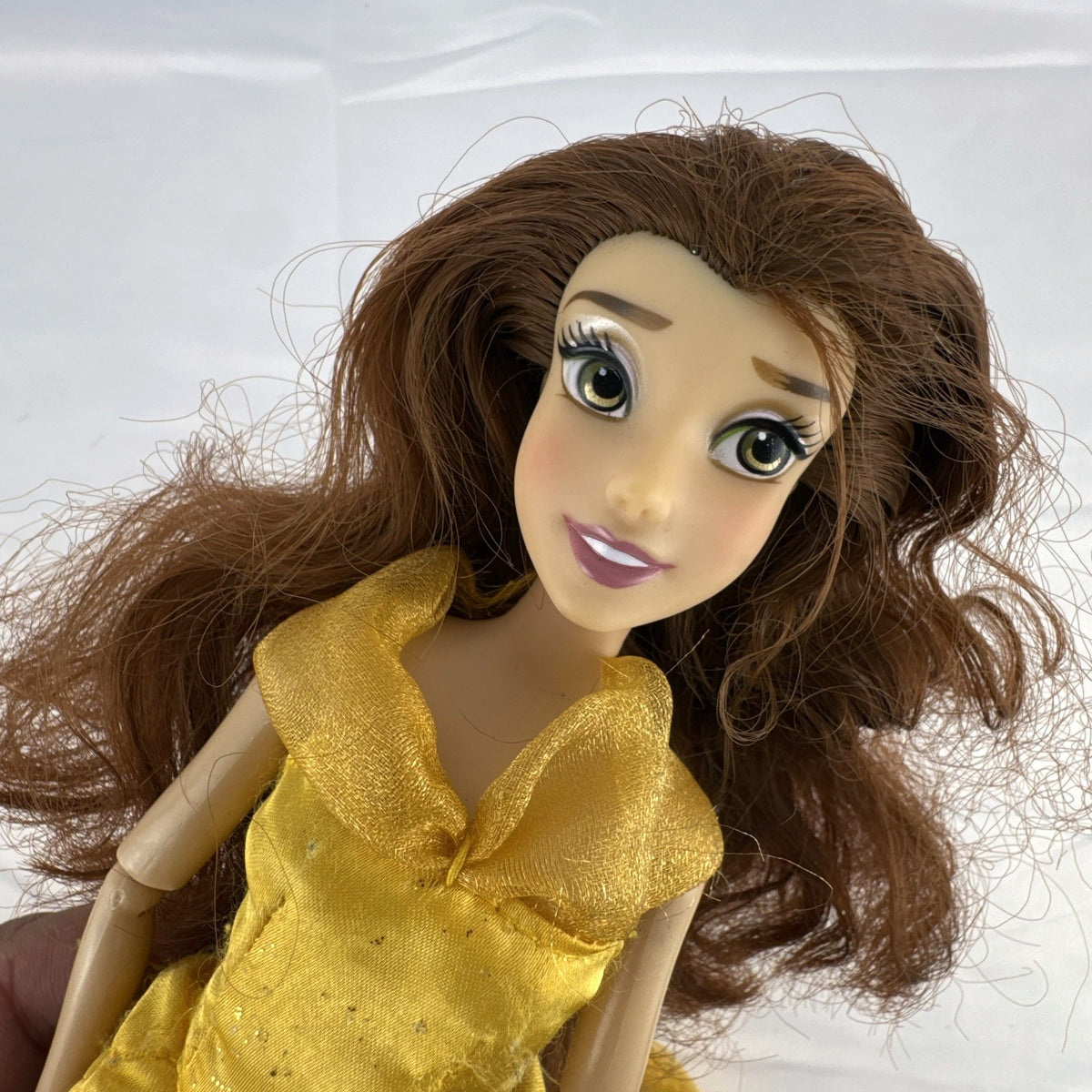Disney Belle 11.5 inch articulated fashion doll wearing yellow ballroom gown
