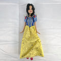 Mattel Disney Princess Snow White 11.5-inch doll wearing signature yellow sparkle gown and red shoes