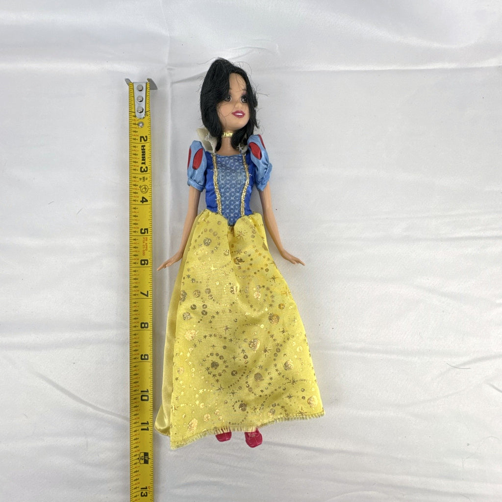 Mattel Disney Princess Snow White 11.5-inch doll wearing signature yellow sparkle gown and red shoes