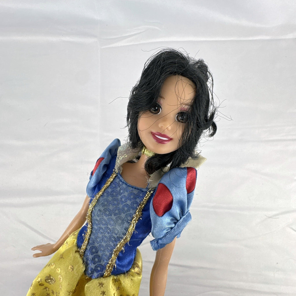 Mattel Disney Princess Snow White 11.5-inch doll wearing signature yellow sparkle gown and red shoes