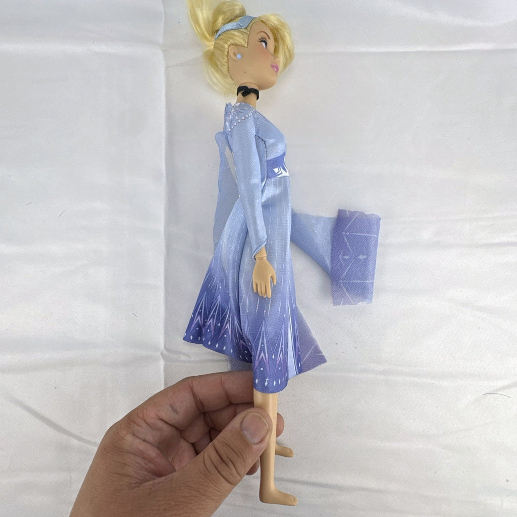 Disney Cinderella 11.5-inch articulated fashion doll wearing Frozen 2 Elsa blue travel dress