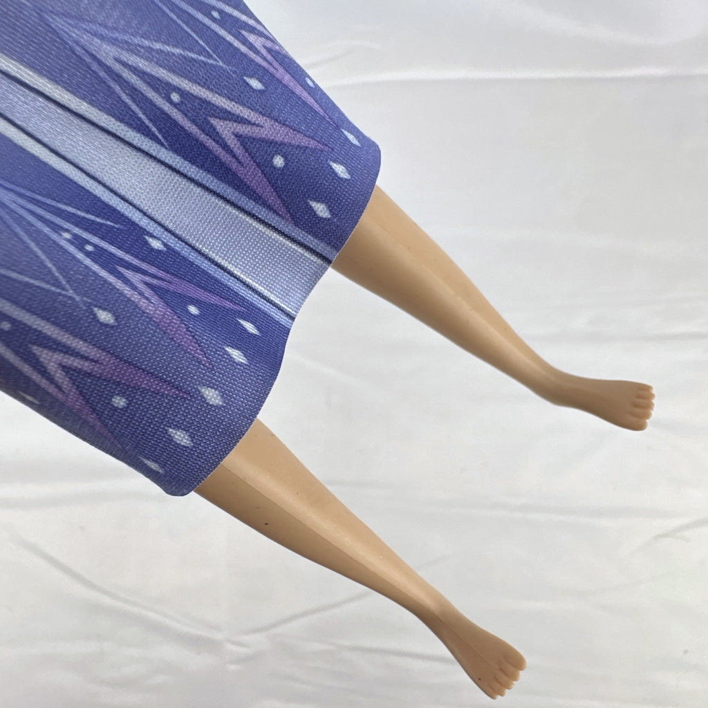 Disney Cinderella 11.5-inch articulated fashion doll wearing Frozen 2 Elsa blue travel dress