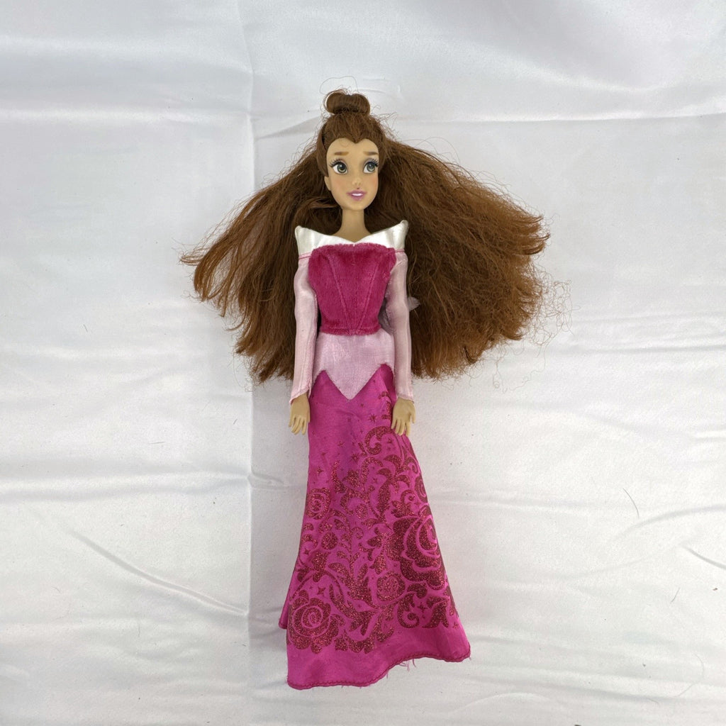Disney Store 12-inch Belle fashion doll with brown hair wearing a pink and magenta glitter gown