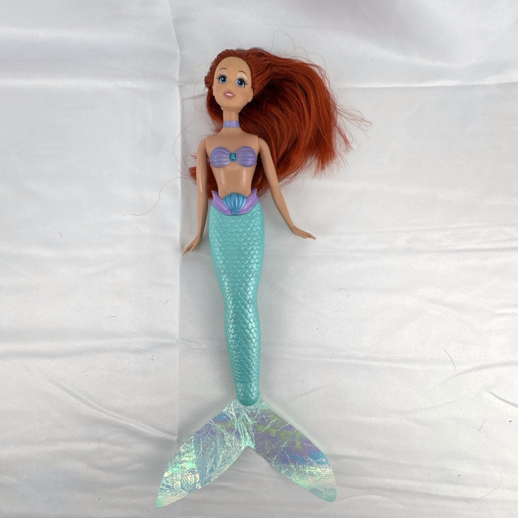 2005 Disney Princess 13-inch Ariel fashion doll with purple seashell bodice and iridescent turquoise tail fin