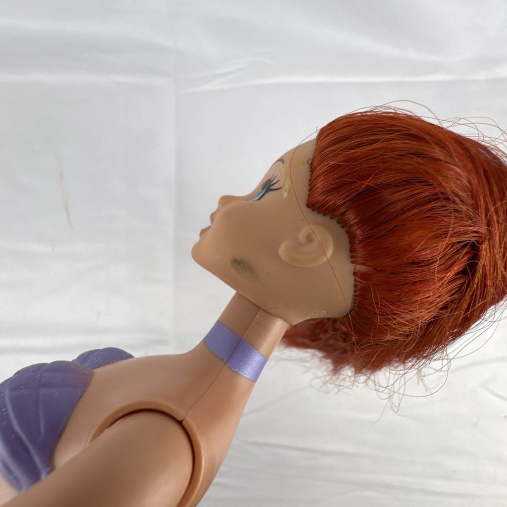 2005 Disney Princess 13-inch Ariel fashion doll with purple seashell bodice and iridescent turquoise tail fin