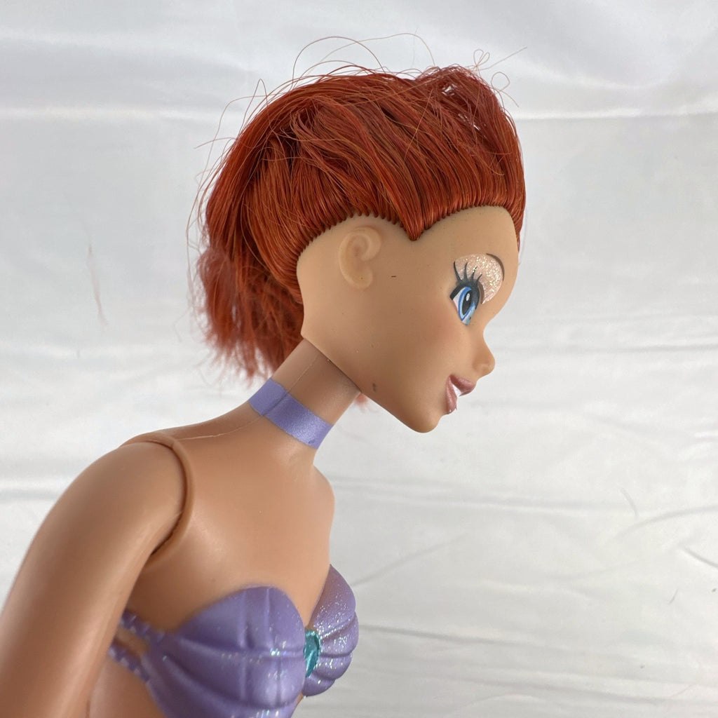 2005 Disney Princess 13-inch Ariel fashion doll with purple seashell bodice and iridescent turquoise tail fin