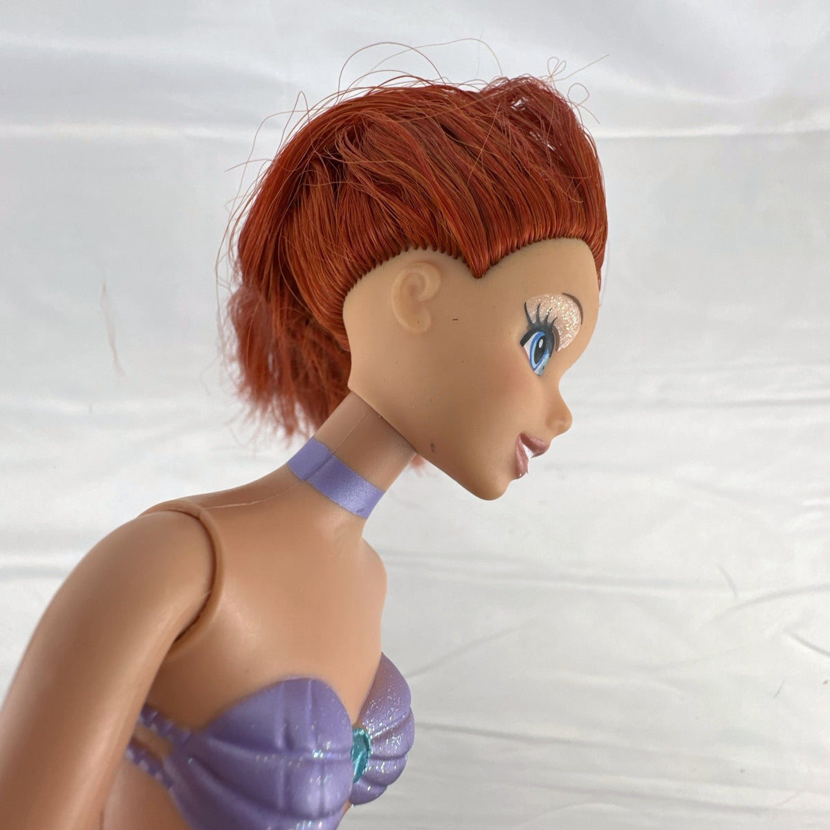 2005 Disney Princess 13-inch Ariel fashion doll with purple seashell bodice and iridescent turquoise tail fin