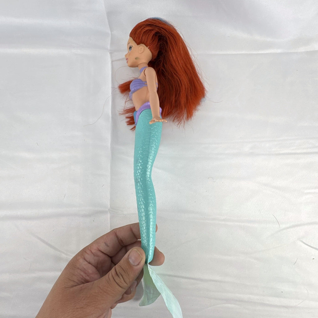 2005 Disney Princess 13-inch Ariel fashion doll with purple seashell bodice and iridescent turquoise tail fin