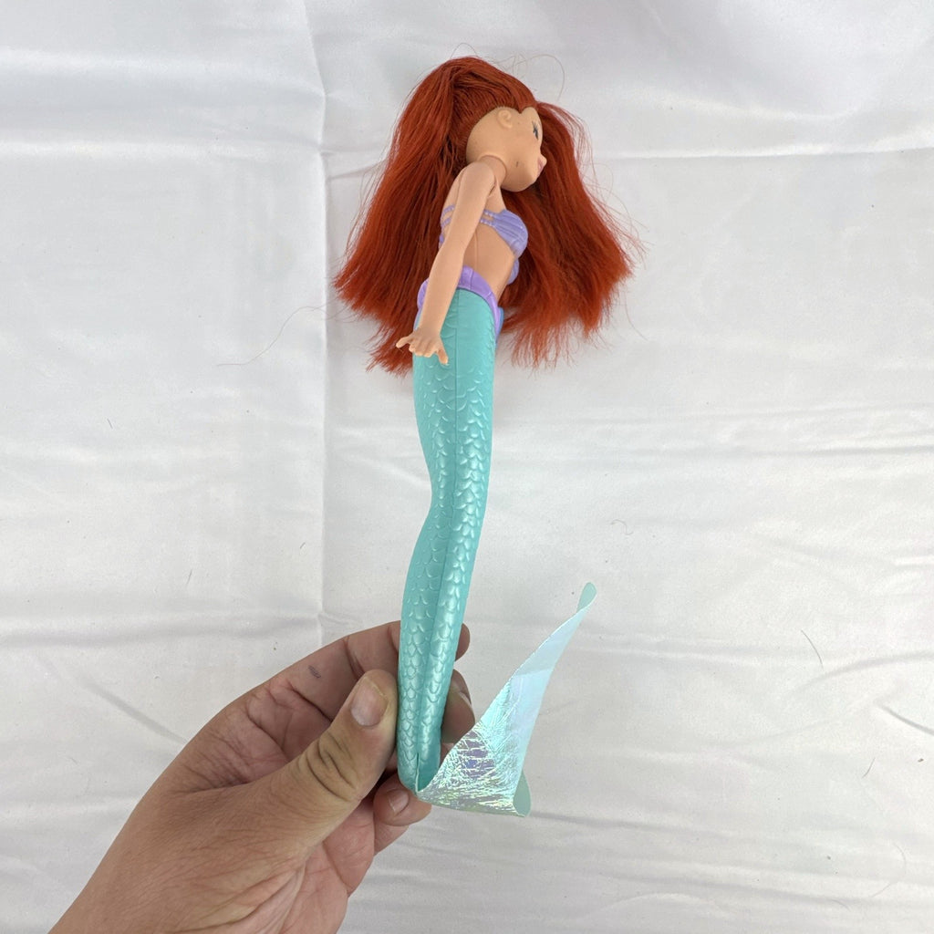 2005 Disney Princess 13-inch Ariel fashion doll with purple seashell bodice and iridescent turquoise tail fin