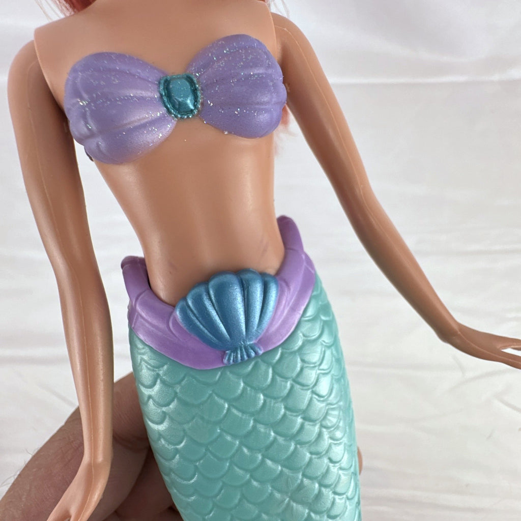 2005 Disney Princess 13-inch Ariel fashion doll with purple seashell bodice and iridescent turquoise tail fin
