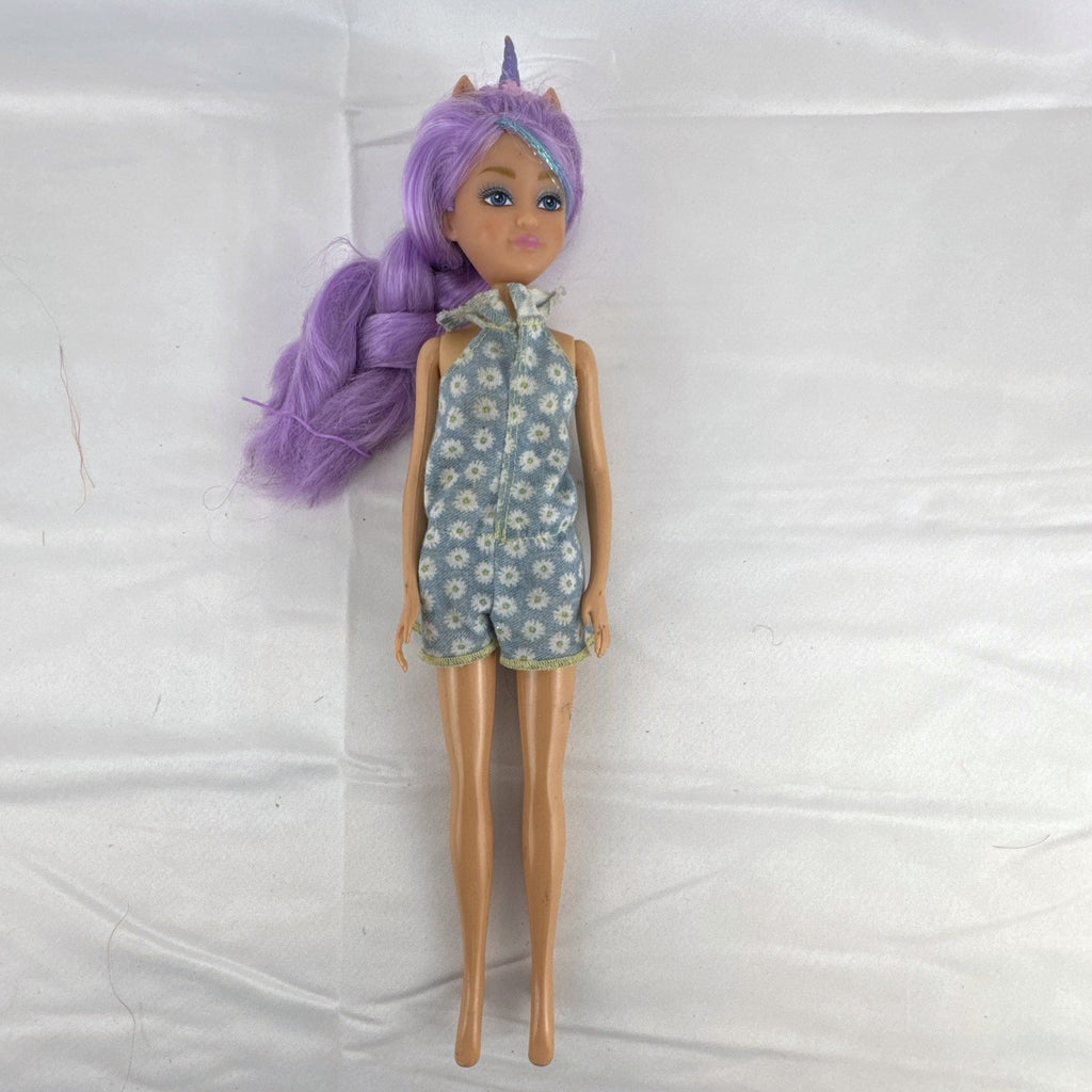 ZURU Sparkle Girlz 10.5-inch unicorn princess doll with purple tinsel hair wearing a blue daisy romper