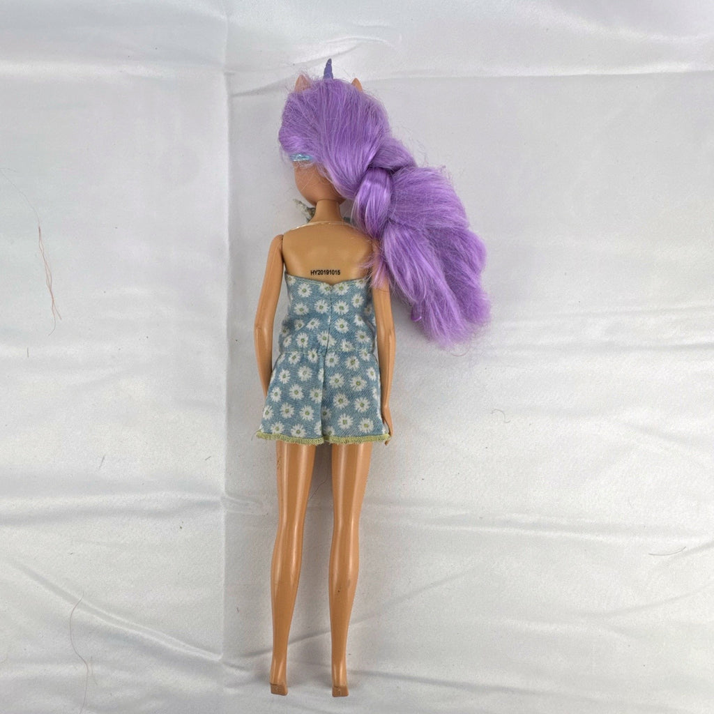 ZURU Sparkle Girlz 10.5-inch unicorn princess doll with purple tinsel hair wearing a blue daisy romper