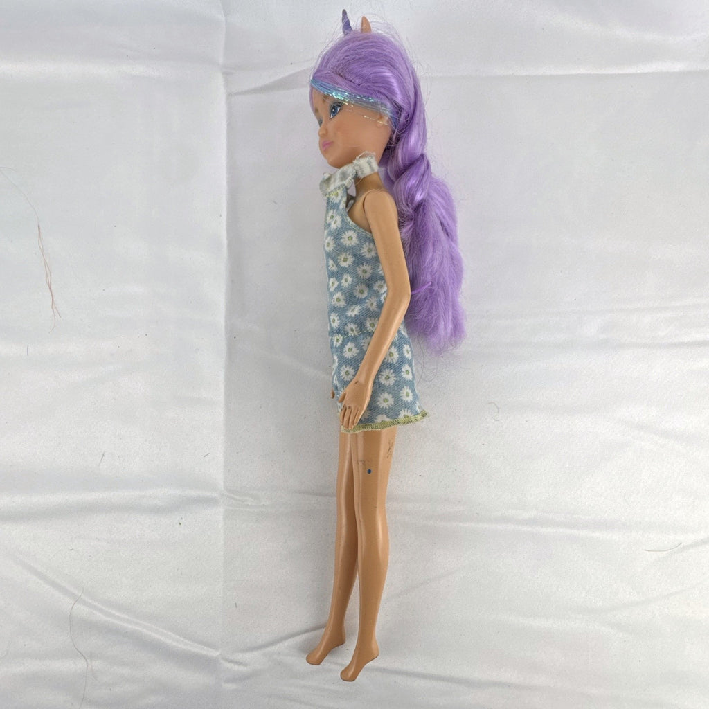 ZURU Sparkle Girlz 10.5-inch unicorn princess doll with purple tinsel hair wearing a blue daisy romper