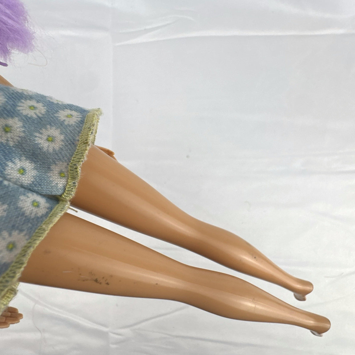 ZURU Sparkle Girlz 10.5-inch unicorn princess doll with purple tinsel hair wearing a blue daisy romper