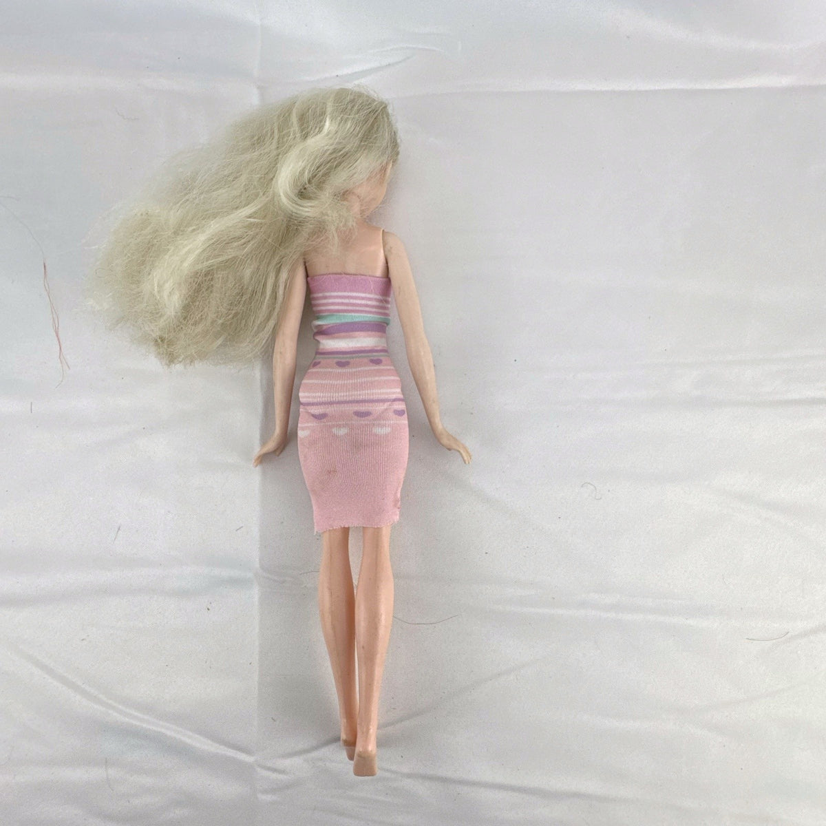 Disney Frozen Elsa 11-inch fashion doll with blonde hair wearing a pink striped heart dress
