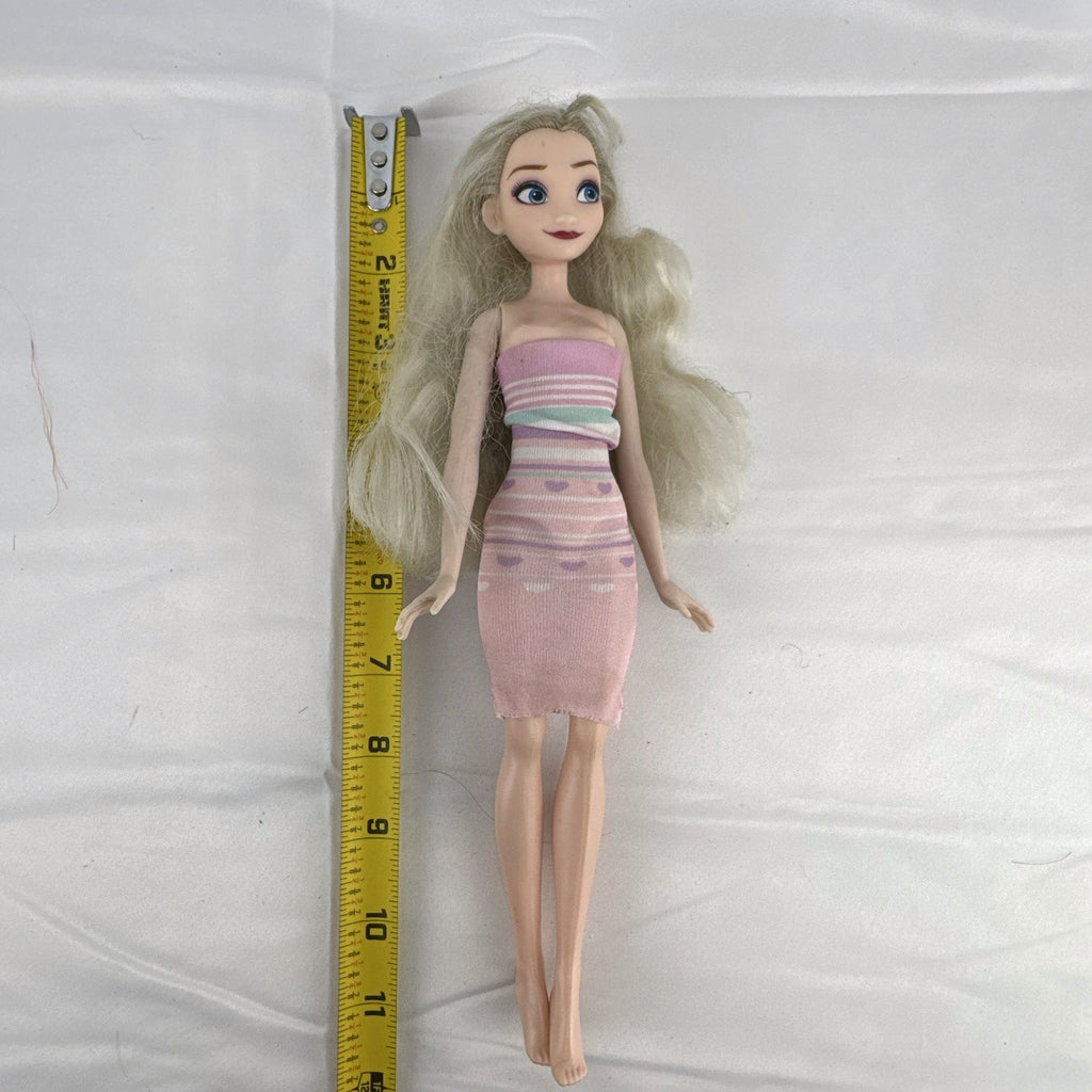 Disney Frozen Elsa 11-inch fashion doll with blonde hair wearing a pink striped heart dress