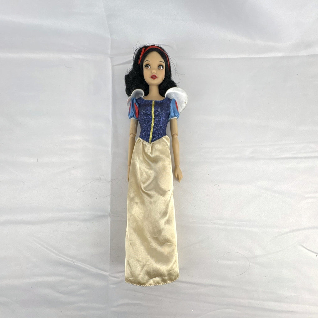 Disney Store Snow White 11.5-inch fashion doll in classic blue and yellow gown with articulated arms